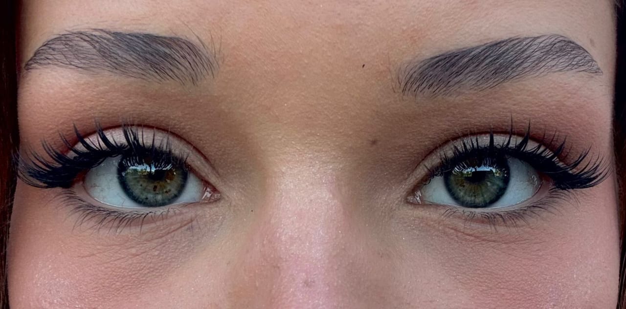 Eyelash extensions with shaped and laminated brows
