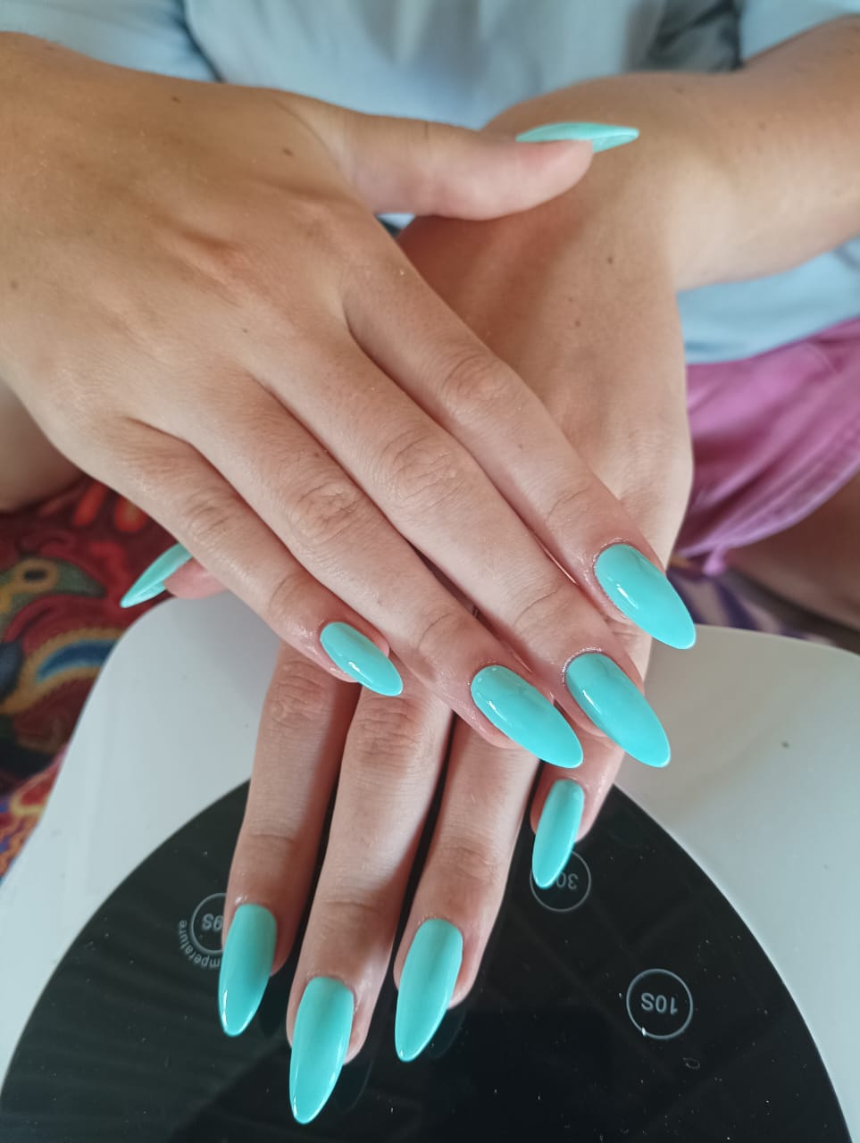 Turquoise gel extensions, long almond shape